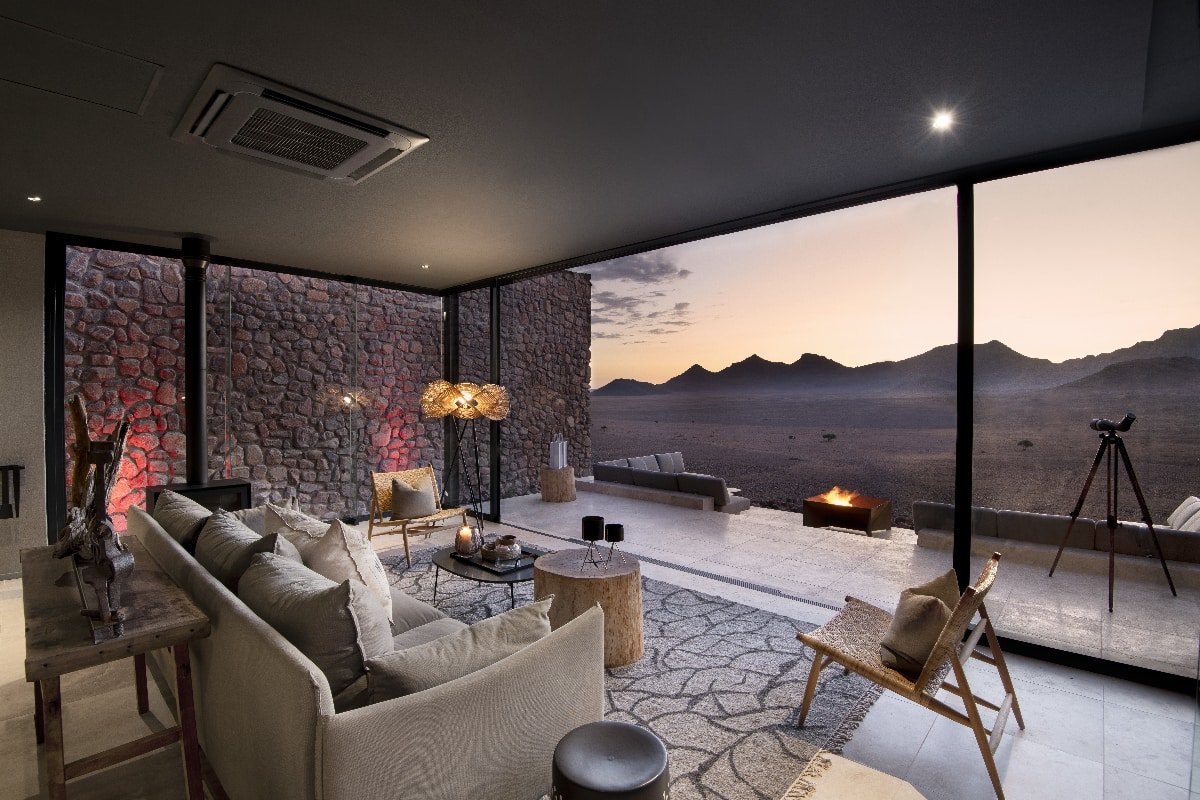 The Star Dune suite's lounge overlooking the desert at sunset