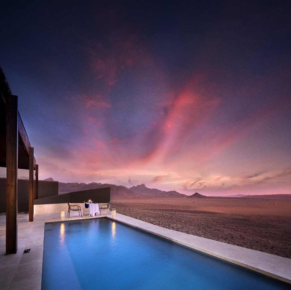 Poolside private dinner at sunset - Sossusvlei Desert Lodge, Namibia